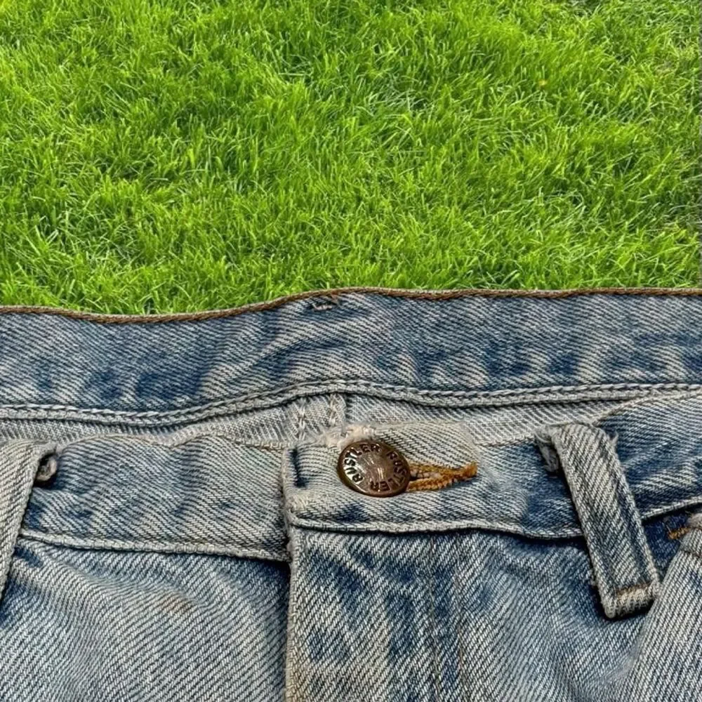 2000s rustler light wash Jean